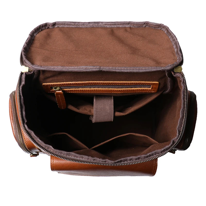 Brown leather bag with open compartments on a white background