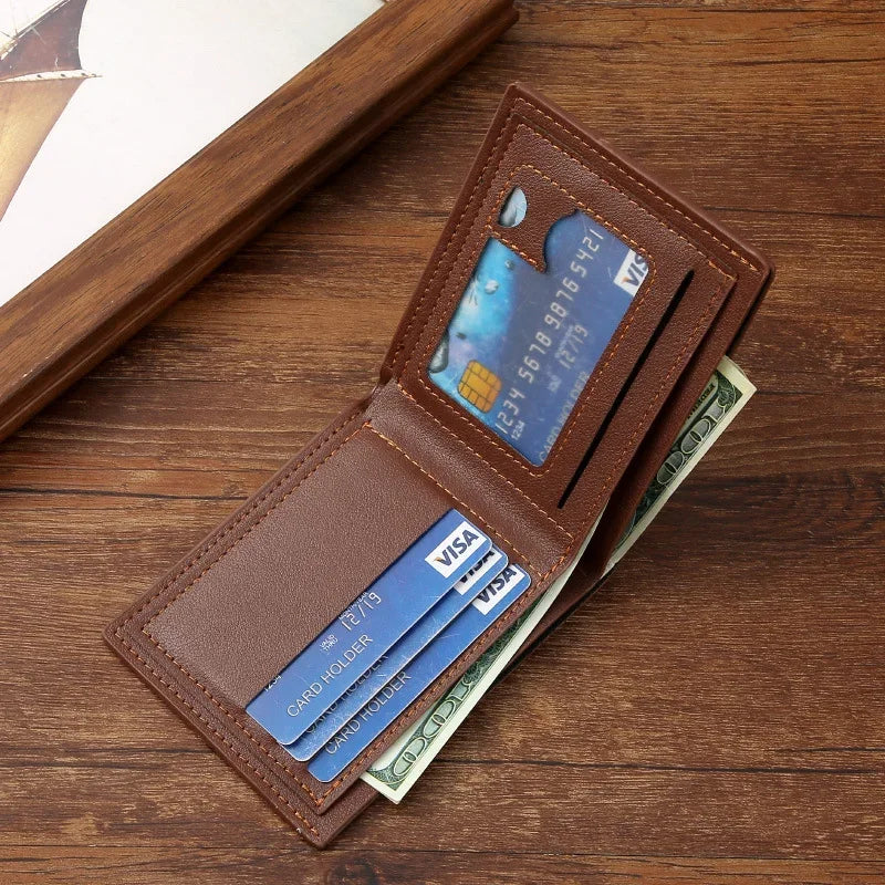 Brown leather wallet with cards and money on a wooden surface