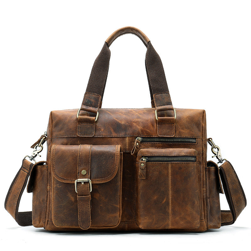 Brown leather bag with multiple pockets and straps on a white background