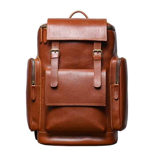 Brown leather backpack on a white background