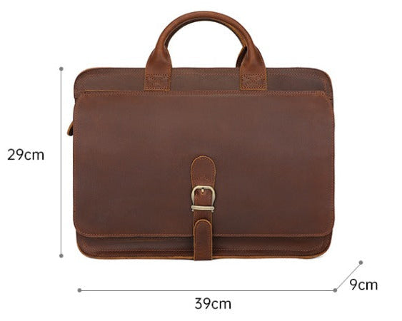Brown leather briefcase with measurements on a white background
